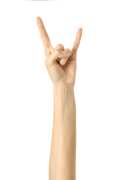 Rock en roll. Vrouw hand gebaren geïsoleerd op wit - Foto, afbeelding
