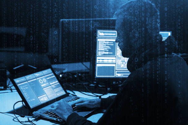 Hacker making cryptocurrency fraud using virus software and computer interface. Blockchain cyberattack, ddos and malware concept. Underground office background. - Foto, Imagem