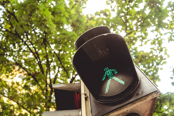 A low angle shot of the traffic light on the street - Foto, immagini
