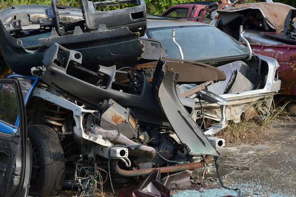Chiang Mai, Thailand - September 5, 2020. Dirty and wreck cars  at the car cemetery. - Photo, Image