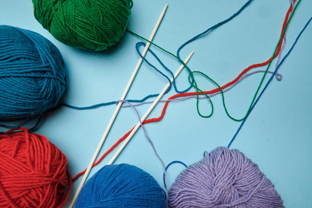Group of various yarn balls and knitting needles closeup, for instagram - Fotó, kép
