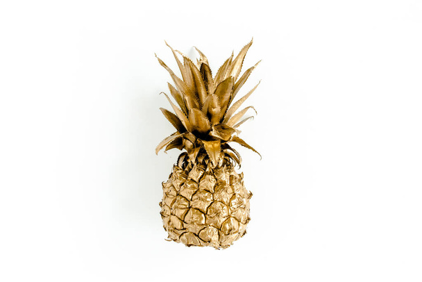 Top view golden pineapple isolated on white background. Food concept. Template blog social media. Minimal style. flat lay - Foto, Imagen