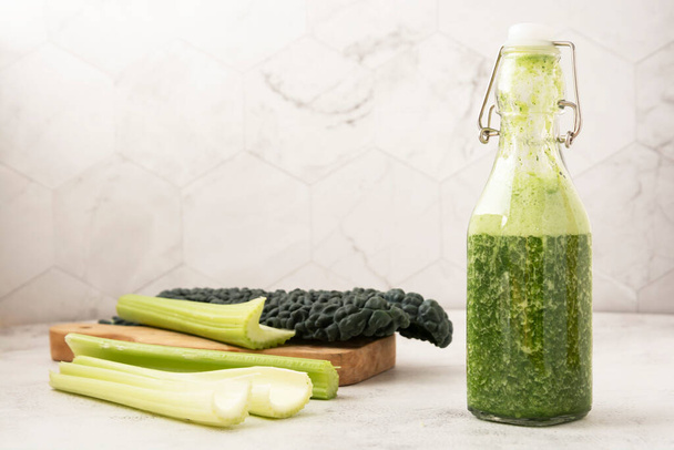 Fresh smoothie with green fruits and vegetables. Detox, dieting, clean food eating - 写真・画像