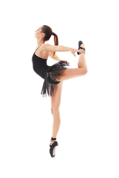 young beautiful baliet dancer posing on a studio - Fotografie, Obrázek