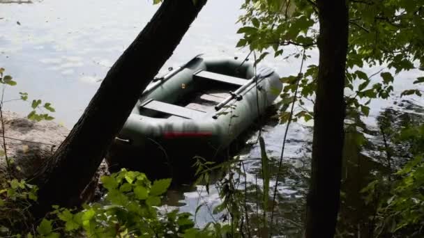 lonely rubber inflatable boat near the shore. - Footage, Video