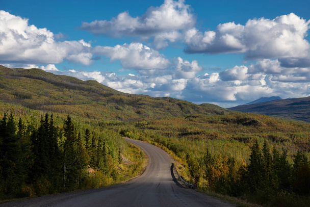 Scenic Road View of Klondike Hwy during a sunny and cloudy day. - Fotó, kép