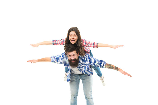 Let be free. Happy father and daughter pretend flying. Set free and fly. In flight. Free play. Family vacation. Adventure trip. Air transport. Travelling by plane. Photo studio. Duty free store - Photo, Image