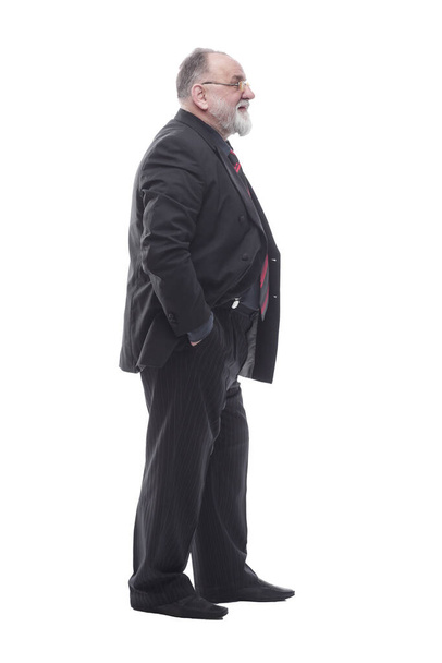 elderly businessman looking forward . isolated on a white - Фото, зображення