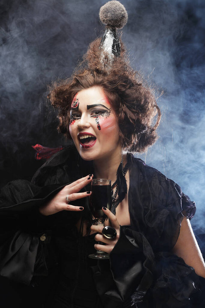 Young woman with creative make up. Halloween theme. - Photo, Image