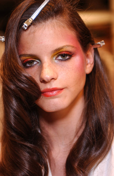 PARIS FRANCE - OCTOBER 12, 2003 Model  Jeisa Chiminazzo getting ready backstage for runway fashion show of Valentino Ready-To-Wear collection during Paris Spring Summer 2004 fashion week. Paris, - Φωτογραφία, εικόνα