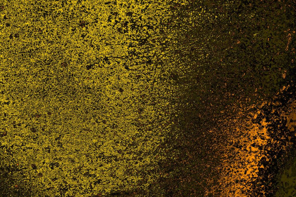 Crimson yellow and black colored grungy wall, textured background - Photo, Image