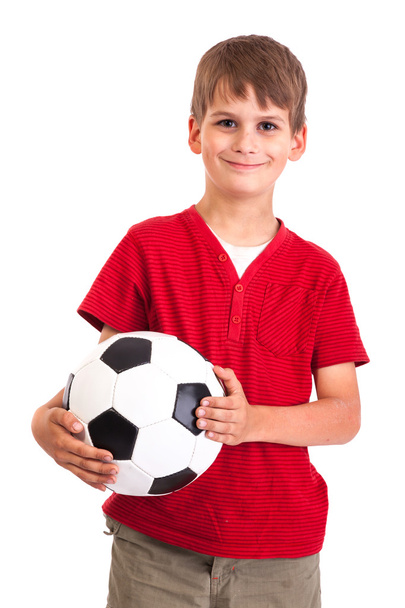 Cute boy is holding a football ball - 写真・画像