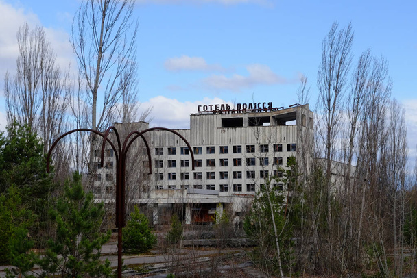 The Polissya hotel is one of the tallest buildings in the abandoned city of Pripyat, Ukraine (which was affected by the Chernobyl disaster). - Fotó, kép