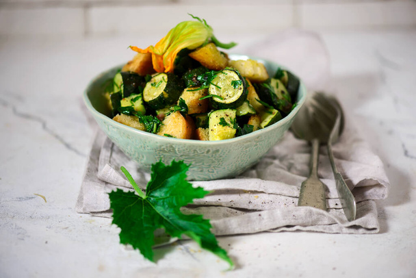 Zucchini and bread warm salad..style vintage.selective focus - Photo, Image