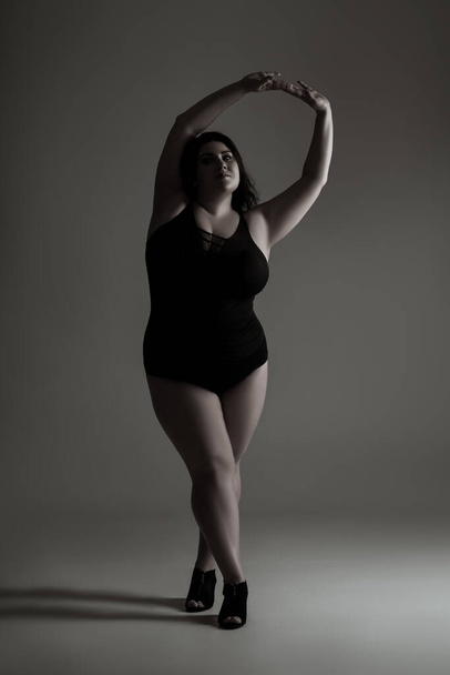 Sexy plus size fashion model in one-piece swimsuit, fat woman in lingerie, black and white image, body positive concept - Photo, Image