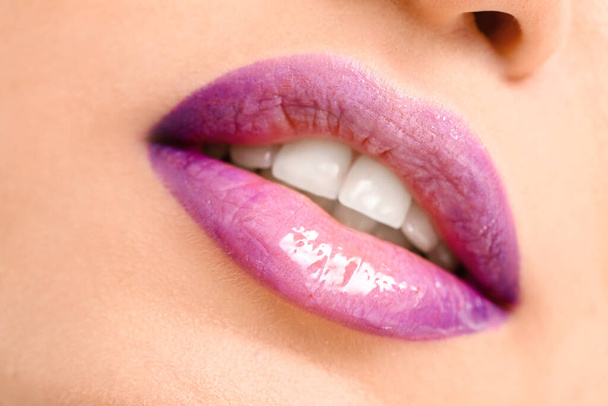 Beautiful young woman with bright lips, closeup - Фото, зображення
