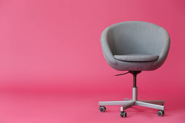 Swivel chair on color background - Photo, image