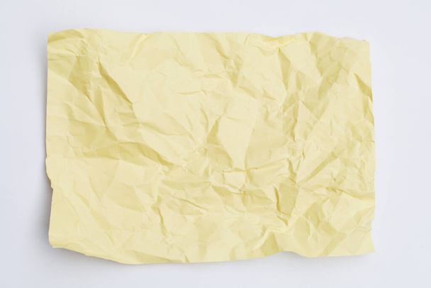 yellow crumpled paper background, texture for web design screensavers. Template for various purposes or creating packaging. - Photo, Image