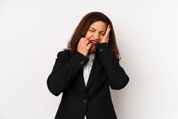 Middle age latin business woman isolated whining and crying disconsolately. - Photo, Image