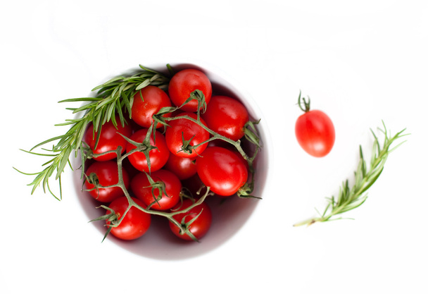 Tomatoes and rosemarie on white - Foto, Imagem