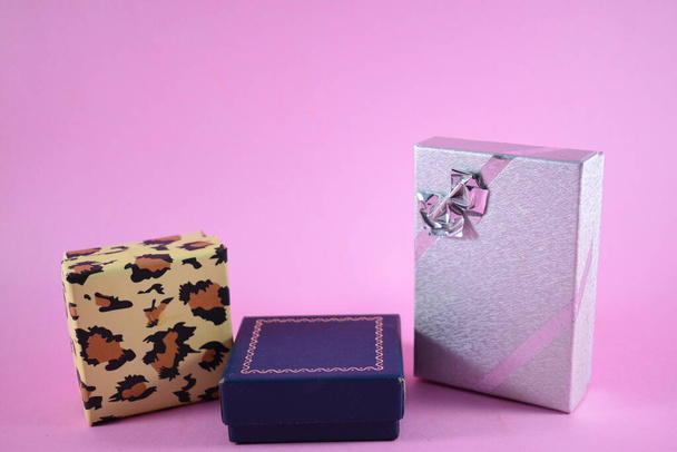 gifts and presents on a pink background - Photo, Image