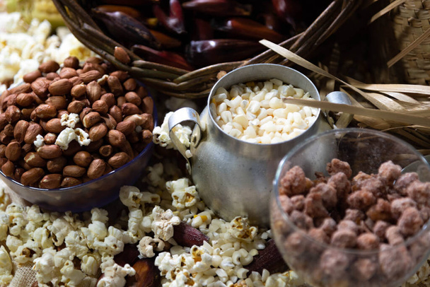 Typical foods. Sweet and savory. June festivals in Brazil. Carrapinha, popcorn, hominy and pine nuts. Manta ray. St. John's Day. Typical festivals. Brazilian folklore. Goodies. - Photo, Image