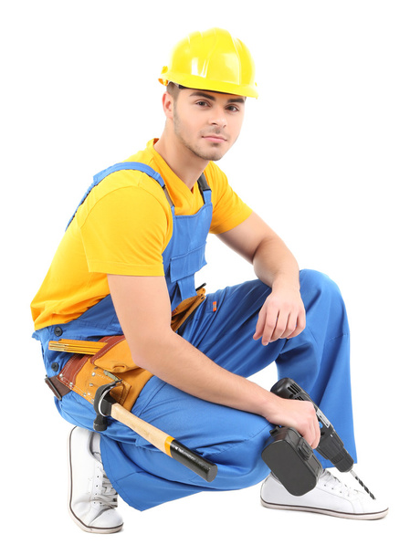Male builder in yellow helmet isolated on white - Foto, Imagem