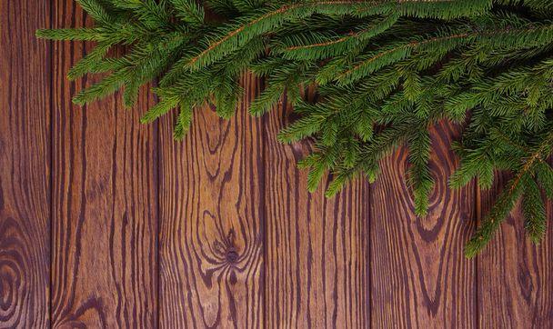 Christmas wooden background with fir tree.  - Foto, Bild