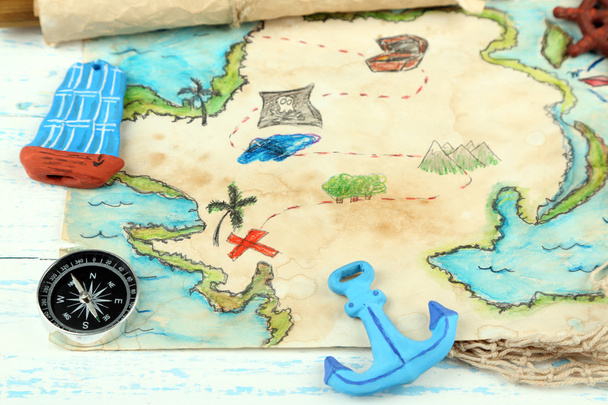 Treasure map with sea accessories, on wooden background - Foto, Imagem
