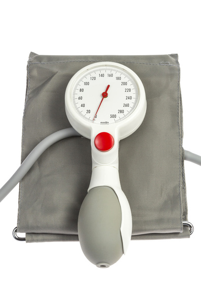 Brazalete de presión arterial en blanco
 - Foto, Imagen