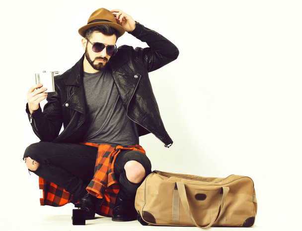 Bearded man, caucasian stylish hipster with moustache holding flask - Фото, изображение
