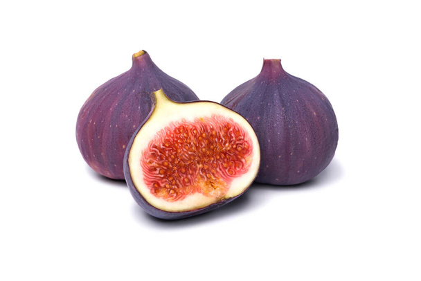 Two fresh figs and half isolated on white background - Photo, Image