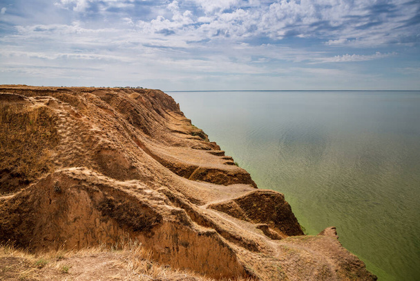 Big cave canyon in the Kherson region on the seashore. - Photo, Image