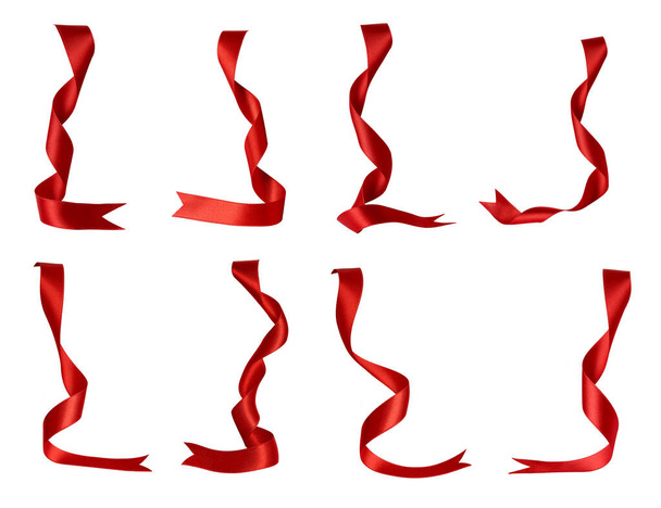 zbiór różnych elementów czerwonej wstążki na białym tle. każdy z nich jest nagrywany oddzielnie. - Zdjęcie, obraz