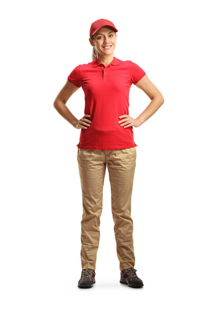 Full length portrait of a female worker smiling isolated on white background  - Fotoğraf, Görsel