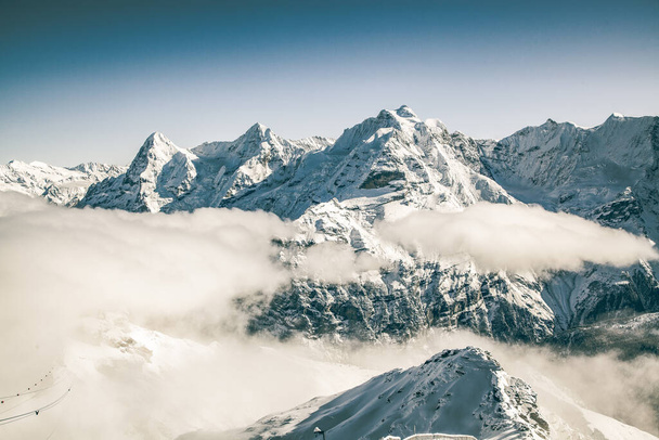 amazing snow covered peaks in the Swiss alps Jungfrau region from Schilthorn - Photo, Image