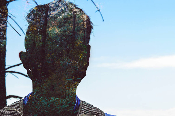 silhouette of man with forest in the background, double exposure - Photo, image