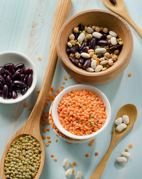 Beans and lentil on a wooden table - Foto, Imagen
