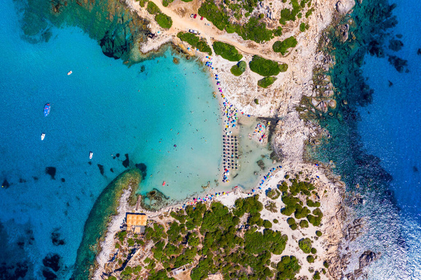 Cost of Sardinia: Peninsula of Punta Molentis. View of beautiful beach at Punta Molentis, Villasimius, Sardinia, Italy. Beautiful bay with sandy beach at Punta Molentis, Sardinia island, Italy. - Photo, image