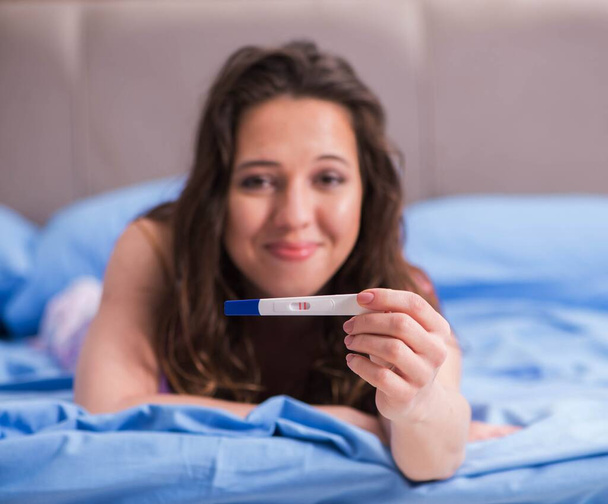 The woman with pregnancy results test - Photo, Image