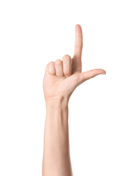 Hand zeigt Buchstabe L auf weißem Hintergrund. Zeichensprache Alphabet - Foto, Bild