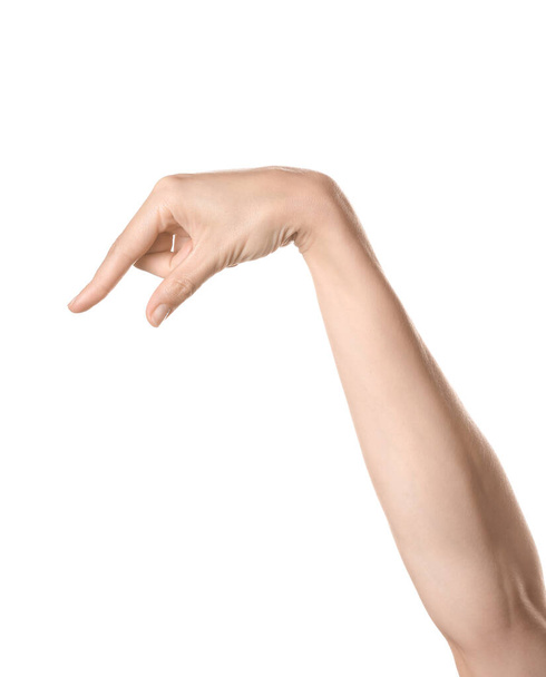 Hand zeigt den Buchstaben Q auf weißem Hintergrund. Zeichensprache Alphabet - Foto, Bild