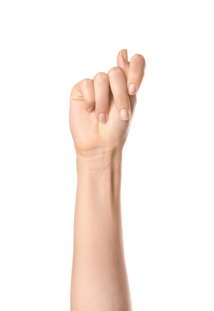 Hand showing letter T on white background. Sign language alphabet - Fotó, kép