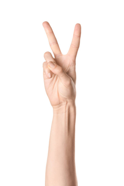 Hand showing letter V on white background. Sign language alphabet - Foto, afbeelding