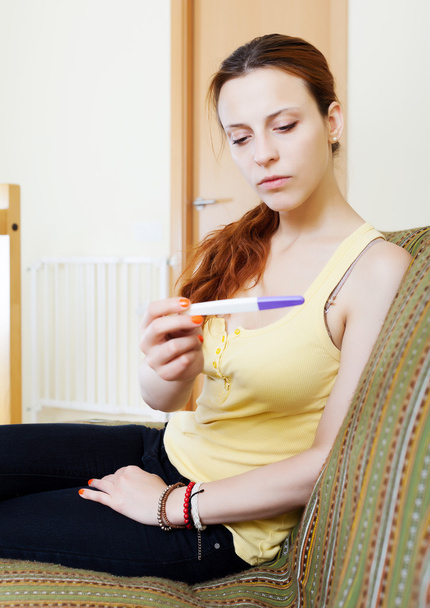 serious girl with pregnancy test - Фото, зображення
