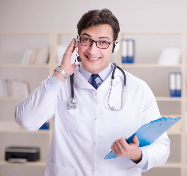 Young man doctor in medical concept - Photo, Image