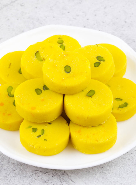 Indian Sweet Food Kesar Peda Also Know as Kesar Mawa Peda, Saffron Sweet, Saffron Peda, Pedha, Pera or Peday is a Saffron Flavoured Soft, Dense Sweet That is Specially Made During Festivals - Photo, Image