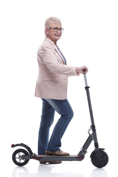 side view. modern elderly woman with electric scooter - Fotoğraf, Görsel