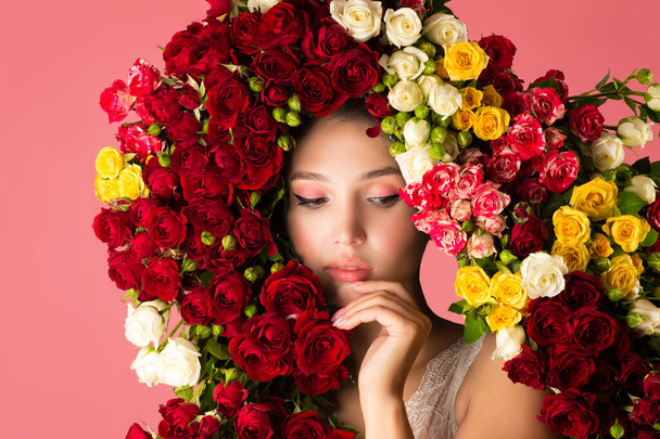charming portrait of pensive woman with rose flowers - Fotó, kép