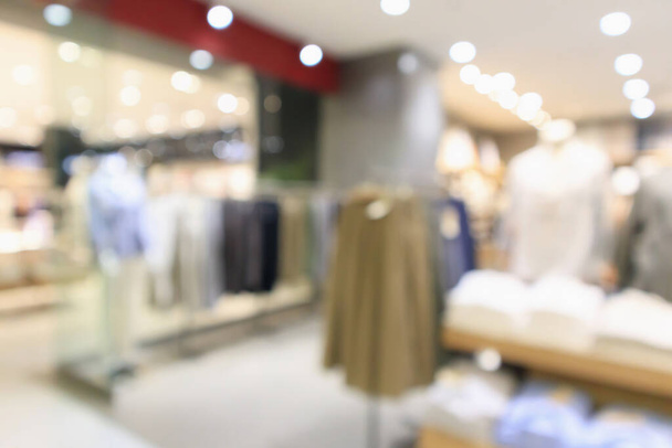 アブストラクトブラー服ブティックディスプレイショッピングモールの背景のインテリア - 写真・画像